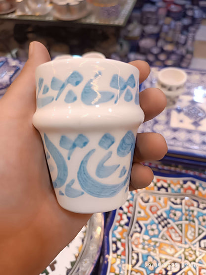 Hand painted dishwasher safe cups featuring Arabic calligraphy design in blue, perfect for coffee or tea.