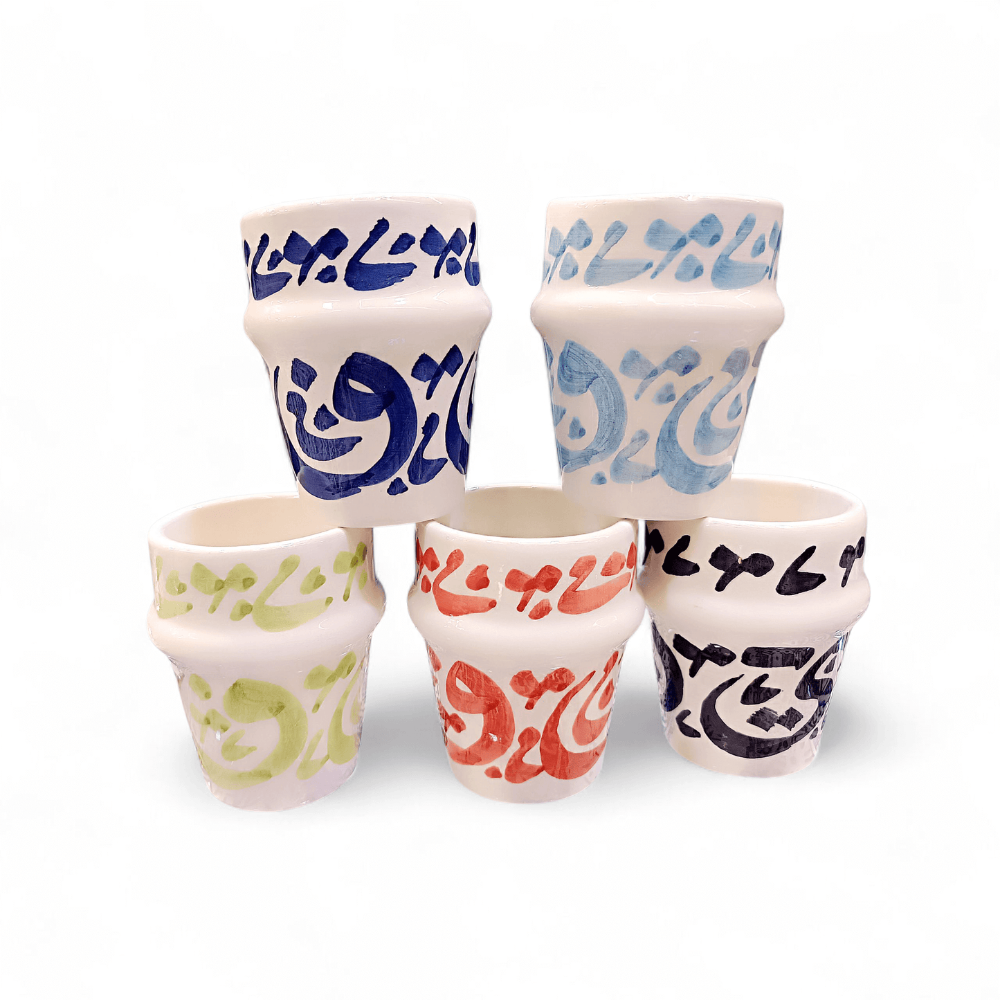 Hand painted dishwasher safe cups featuring vibrant Arabic calligraphy designs in various colors.