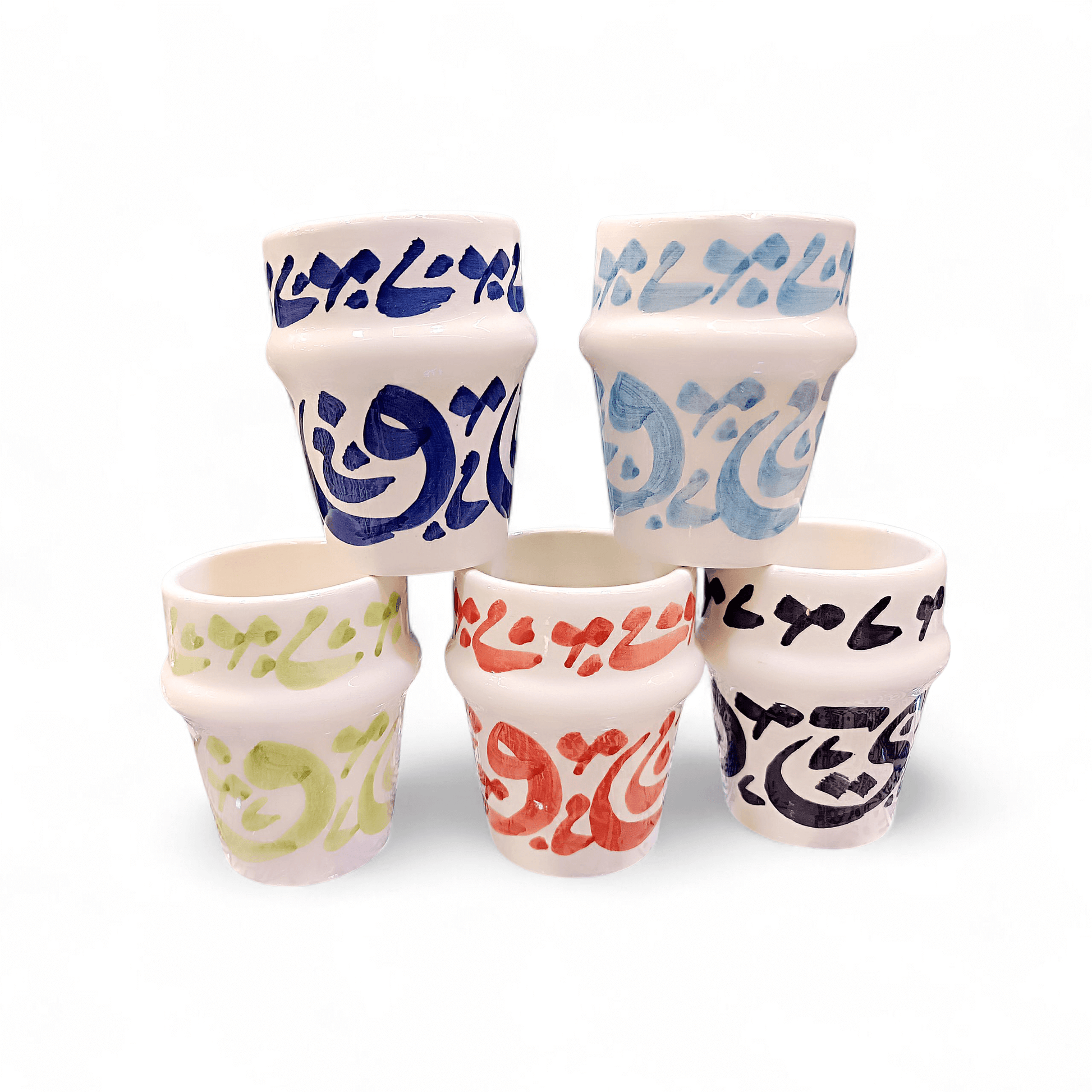 Hand painted dishwasher safe cups featuring vibrant Arabic calligraphy designs in various colors.