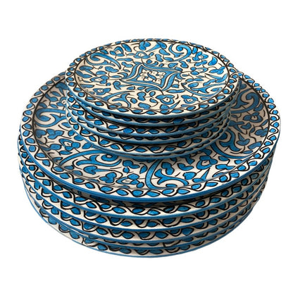 6 Serving plates made of white clay, hand-painted and hand-decorated.